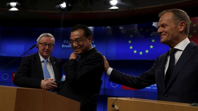 Жан-Клод Юнкер, Ли Къцян и Доналд Туск. © Reuters