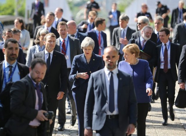 Макрон, Мей и Меркел на Моста на влюбените, Reuters