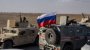 © ReutersИзтегляне на кюрдски бойци (под наблюдението на руски сили) от граничните райони в Сирия, 27 октомври 2019 г.